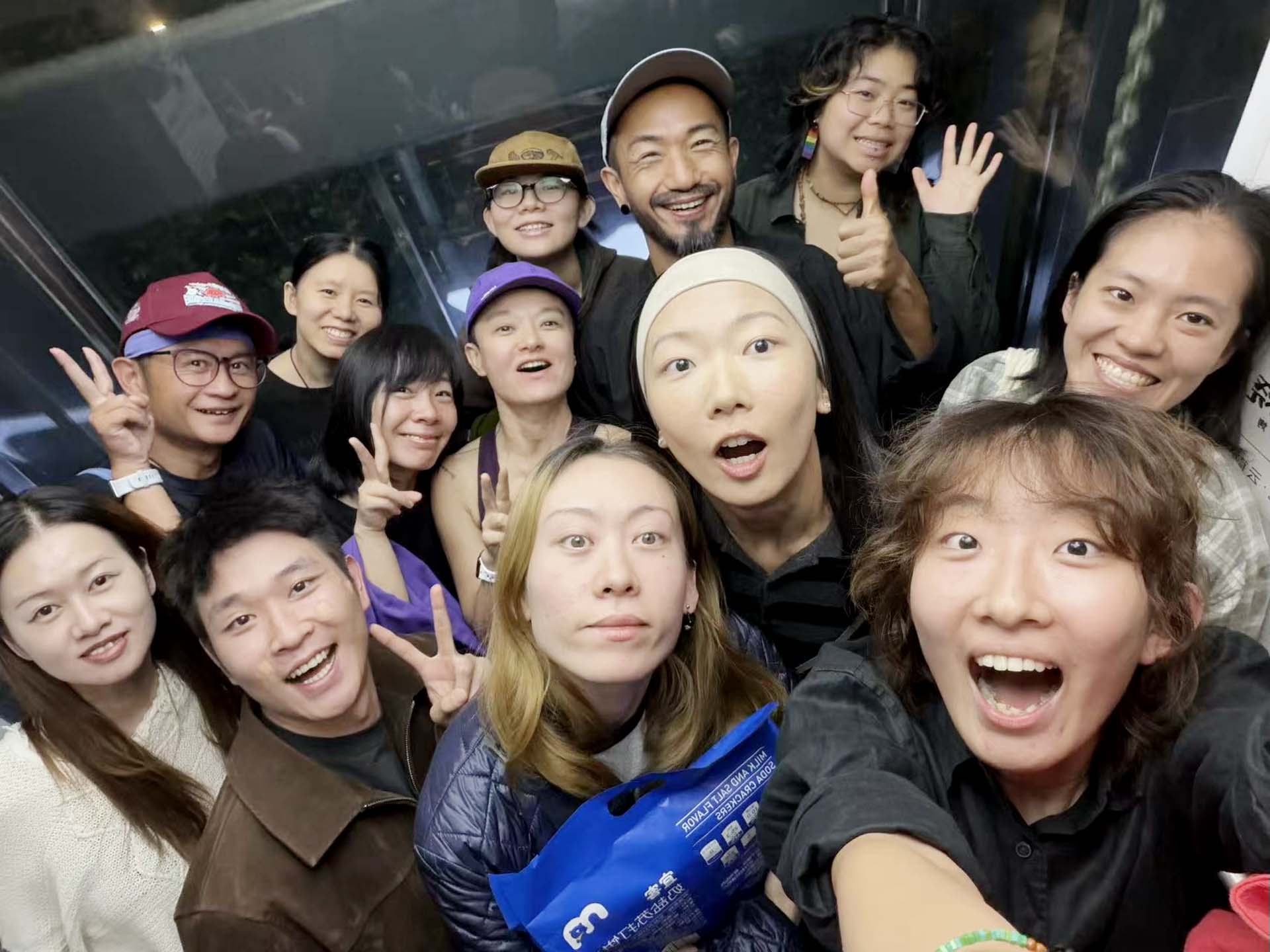 A group photograph of participants in Darling Hurt VI — The Rainbow