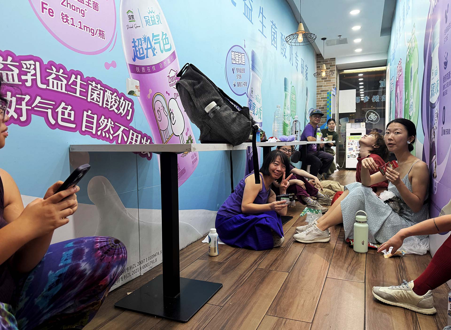 Participants resting at a FamilyMart near People’s Square on the day of the work